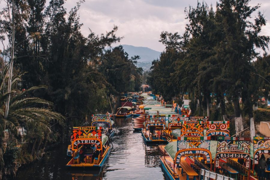 Don’t forget to spend an afternoon riding on a colorful trajinera through Xochimilco’s canals when you visit your chilango cousins in Mexico City.
